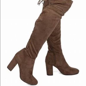 Knee high laced up boots